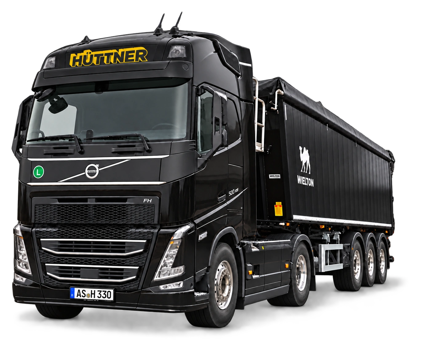 Freigestellter schwarzer Hüttner-Volvo FH 500 mit schwarzem Wielton-Kippsattelauflieger in frontaler Dreiviertelansicht